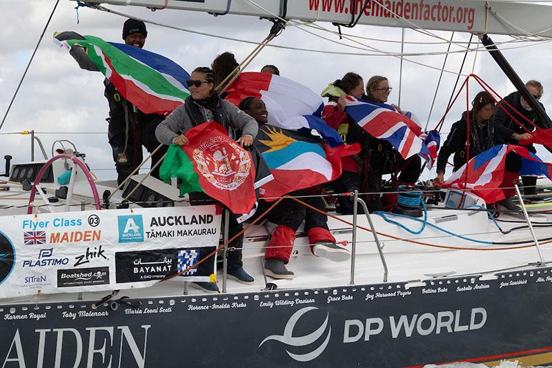 The Maiden crew, hailing from the UK, Antigua, the USA, South Africa, France, and Afghanistan, proudly flew their country flags at the finish line photo copyright Tim Bishop/PPL / OGR2023 taken at Royal Yacht Squadron and featuring the Ocean Globe Race class